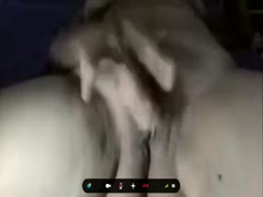 Close-up of my lusty, adulterous, cheating wife massaging her hairy cunt